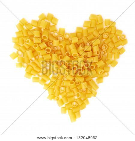 Heart shape made of dry ditalini yellow pasta over isolated white background