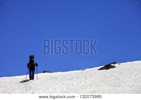 Hiker in snowy mountains at spring. Turkey Kachkar Mountains (highest part of Pontic Mountains).