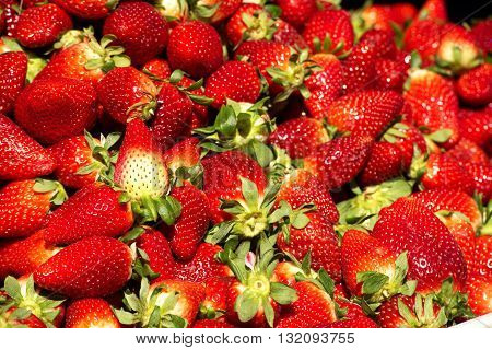 ripe fresh juicy strawberries red on the market