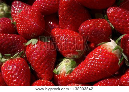 ripe fresh juicy strawberries red on the market