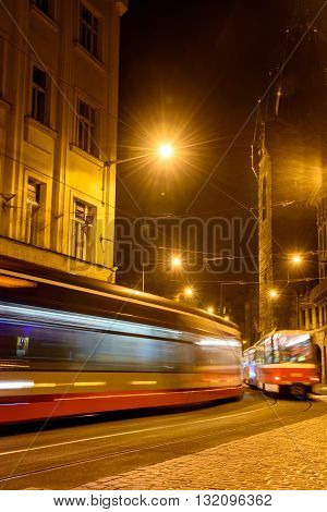 blurred movement on the night street tram in Prague