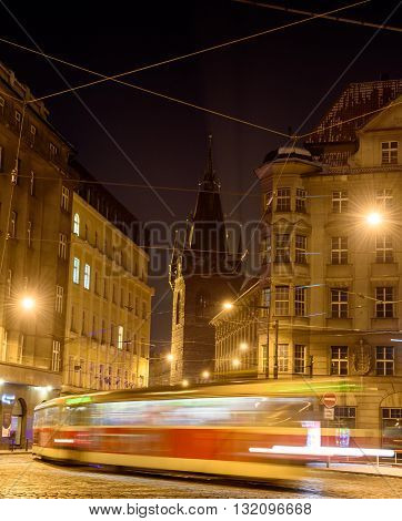 blurred movement on the night street tram in Prague