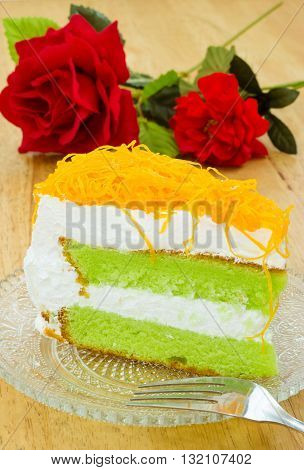Piece of pandan cake with foi thong
