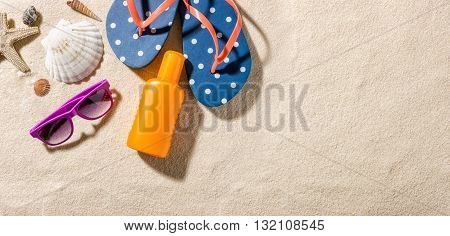 Some beach accessories with copy space on the right side