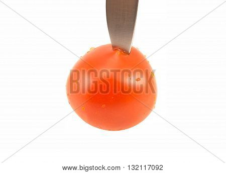 Ripe Red Tomato Cut With A Knife
