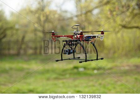 Drone flying in forest