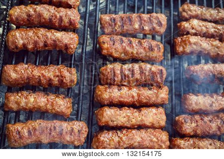 traditional food Meat Balls "mici" on grill