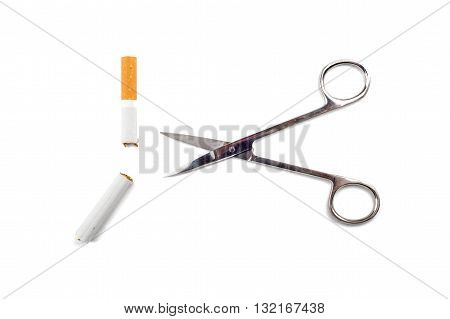 Quit Smoking - Scissors Cut A Cigarette Over A White Background
