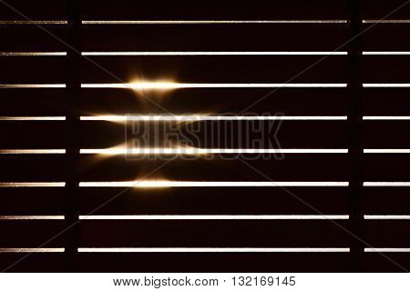 Wooden blinds in the interior of the home.