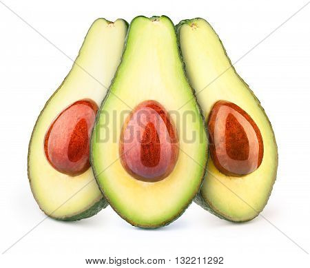 Group of three avocados with oily stones isolated on white, with clipping path