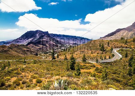 Mountain road near Fataga city on Gran Canaria island, Spain. Gran Canaria is the second most populous island.