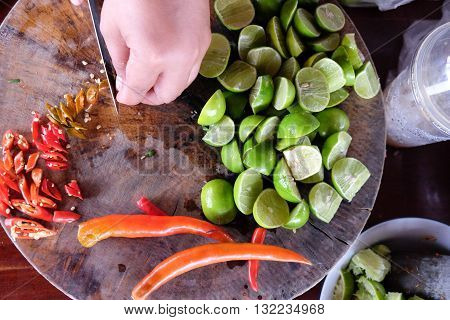 Ingredients set for Thai spicy food include lemon and red chili