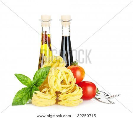 Italian colors food. Basil, pasta, tomatoes, olive oil and vinegar. Isolated on white background