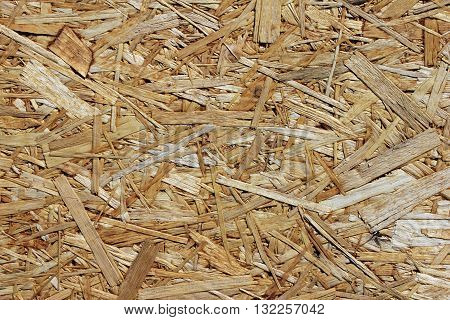 Close up view of particleboard panel. Suitable for an abstract background.