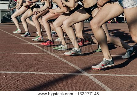 Chelyabinsk Russia - May 24 2016: start of a group of women athletes at stayers distance of 1500 meters in stadium during UrFO Championship in athletics