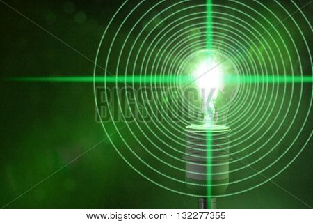 Glowing bulb is emitting circular datastreams of one and zero Lifi concept