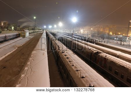 Railway In Winter Night And White Snow