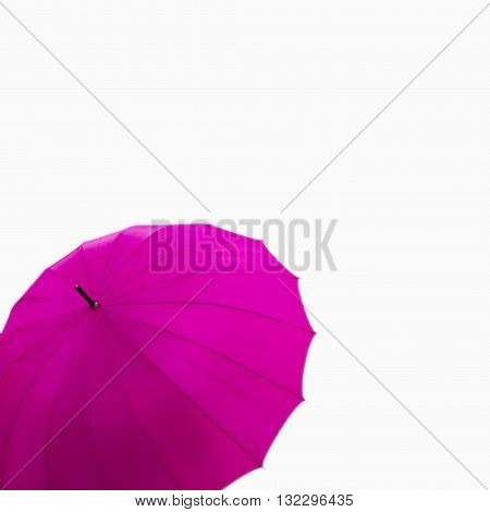 Open pink umbrella isolated on white background