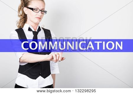 communication written on a virtual screen. Internet technologies in business and tourism. woman in business suit and tie, presses a finger on a virtual screen.