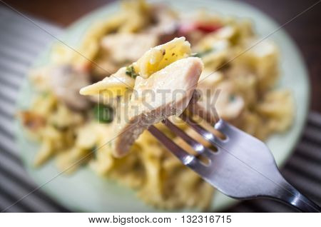 Chicken farfalle alfredo with mushrooms and sundried tomatoes
