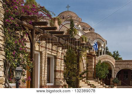 Spring Flowers and Church in the Archangel Michael Monastery in Thassos island, East Macedonia and Thrace, Greece
