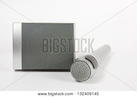 Components of sound-amplifying equipment microphone speaker sound reinforcement speech music components electronics equipment silver background white