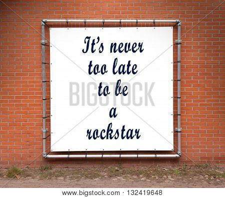 Large Banner With Inspirational Quote On A Brick Wall
