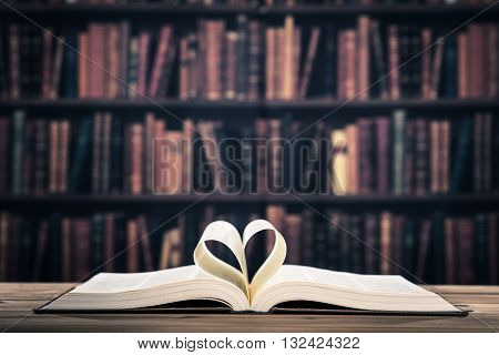 Bookshelf and heavy books on the wood table