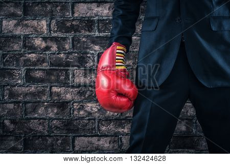 Boxing gloves and Man wearing a suit