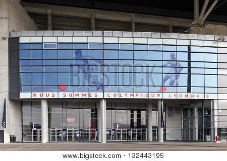 Lyon, France - March 21, 2016: Facade and entrance of the Parc Olympique stadium in Lyon, France. The Parc Olympique is a 60000 seat stadium for French football club Olympique Lyonnais and Euro 2016