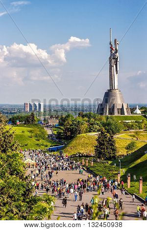 KIEV, UKRAINE - MAY 09: The Motherland Monument also known as Rodina-Mat', decorated with red poppy flower wreath on Victory Day, devoted the Great Patriotic War. May 09, 2016 in Kiev, Ukraine
