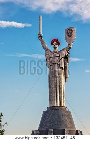 KIEV, UKRAINE - MAY 09: The Motherland Monument also known as Rodina-Mat', decorated with red poppy flower wreath on Victory Day, devoted the Great Patriotic War. May 09, 2016 in Kiev, Ukraine