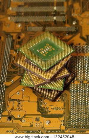 Stack of CPU processor and Circuit board / Motherboard. Electronic computer hardware technology. Motherboard digital chip. Tech science. Information engineering component.