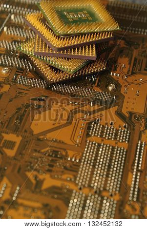 Stack of CPU processor and Circuit board / Motherboard. Electronic computer hardware technology. Motherboard digital chip. Tech science. Information engineering component.
