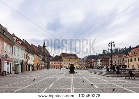 BRASOV ROMANIA - MARCH 09 2016: Photo of downtown and streets with the famous black church view
