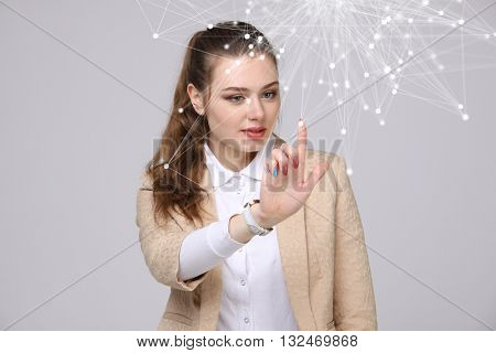 Worldwide network or wireless internet connection futuristic concept. Woman working with linked dots.