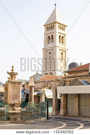 Viev of Old city Jerusalem. Sunny summer day near neautiful building.