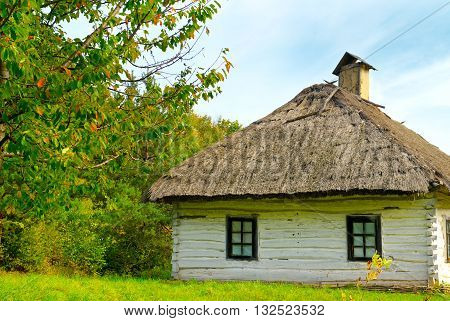 A old farmhouse with a thatched roof