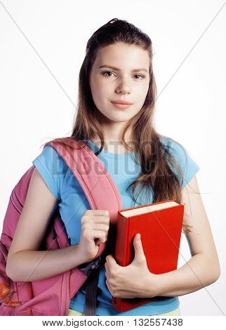 young cute teenage girl posing cheerful against white background with books and backpack isolated