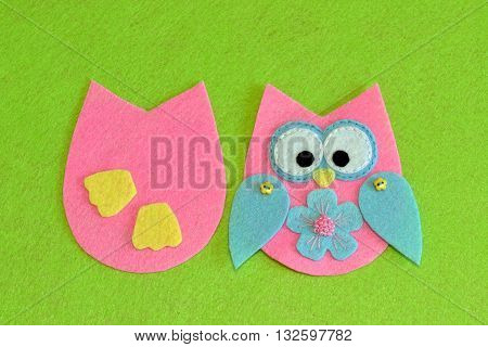 Owl sewing pattern. Stitched details of bird toy. Felt owl ornament tutorial. Decorative cute owl. Idea for arts with scraps of fabric for children. Simple sewing for preschoolers. Green background.
