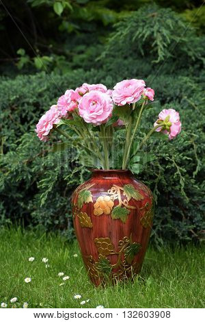 artificial peonies in a vase painted decorative