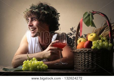 Laughing Bacchus holding a glass
