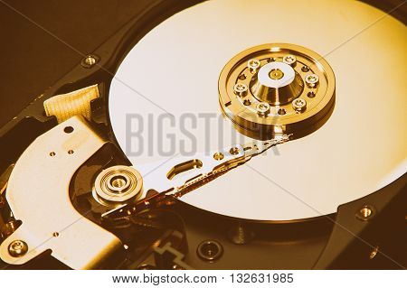 Close up of hard disk's internal mechanism hardware