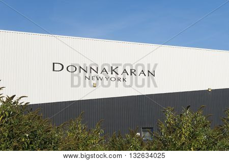 OLDENZAAL NETHERLANDS - OCTOBER 31 2015: Exterior of a Donna Karan warehouse. She is one of the most influential fashion designers in American fashion
