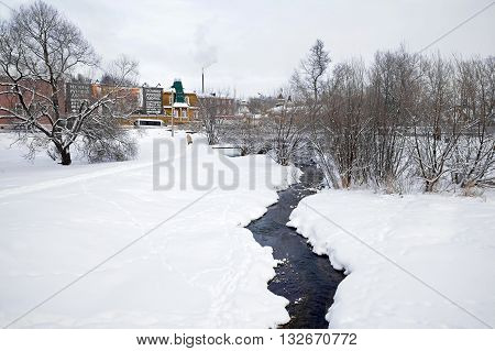 SERGIYEV POSAD RUSSIA - January 02.2010: River Konchury with very cold water which is shifted even in cold weather. Sergiyev Posad