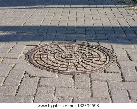 Cast iron cap of the manhole cover
