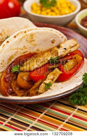 Fajita Chicken Tacos with Grilled Onions and Bell Peppers. Selective focus.