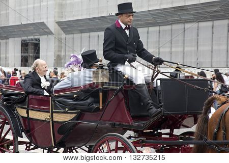 Naples, Italy. May 29, 2016: Participants of the parade of traditional carriages with actors in historical costumes to commemorate  the three hundredth anniversary of the birth of Charles of Spain who was King of Naples from 1734 to 1759