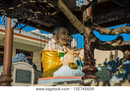 Beautiful Temple. Buddha Sculpture.oid Church, Under Sunny Sky.mui Ne, Vietnam.