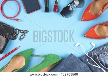 Women Clothing Set And Accessories On A Rustic Wooden Background.top View,  Different Shoes On  Ligh